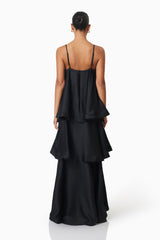 model wearing Tilly Tiered Maxi Dress in Black back shot