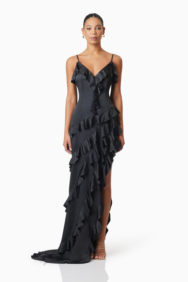 model wearing Kyla Asymmetrical Maxi Dress In Black front shot