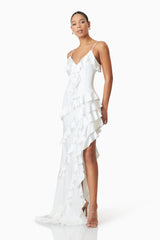 model wearing Kyla Asymmetrical Maxi Dress in White side shot