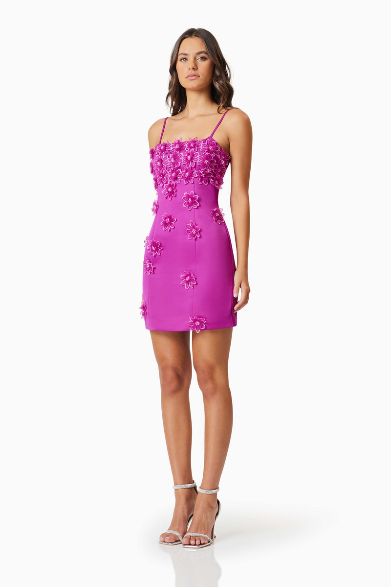 Brunette model wearing Sutton Mini Dress in Purple side shot
