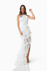 Brunette model wearing Celeana Textured Sheer Dress in White moving