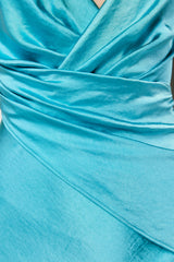 JUNIA WRAPPED NECKLINE MAXI DRESS IN BLUE