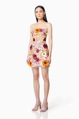 model wearing Arabella floral mini dress in multi side shot