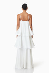 model wearing Tilly Tiered Maxi Dress in White back shot