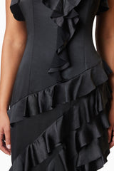 model wearing Kyla Asymmetrical Maxi Dress In Black close up shot