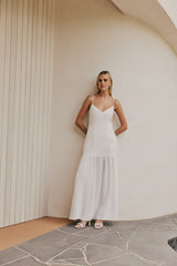 Blonde Model wearing CURAAE Palm Drop Waist Frill Summer Maxi Dress In White front shot