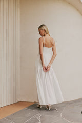 Blonde Model wearing CURAAE Palm Drop Waist Frill Summer Maxi Dress In White back shot