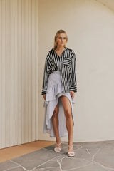 blonde model wears CURAAE Azalea Oversized Contract Stripe Loose Shirt In Black & White front shot