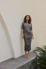 Model wearing Esme Short Sleeves Crew Rib T-Shirt in Stone Gray movement shot