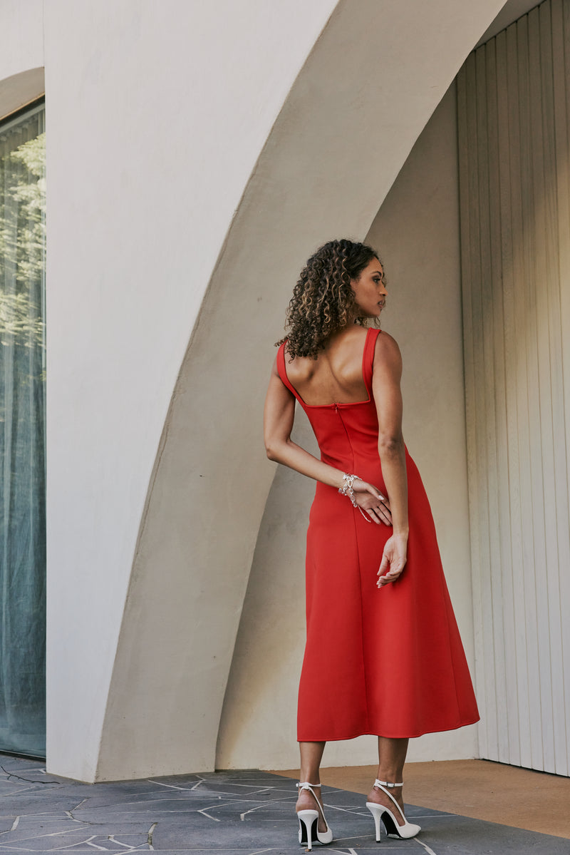 model wearing CURAEE Mia Midi Dress In Cherry Red back shot