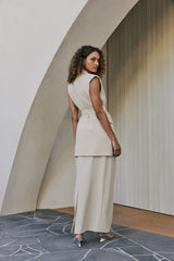 Model wearing Aveline Skirt In Beige back shot