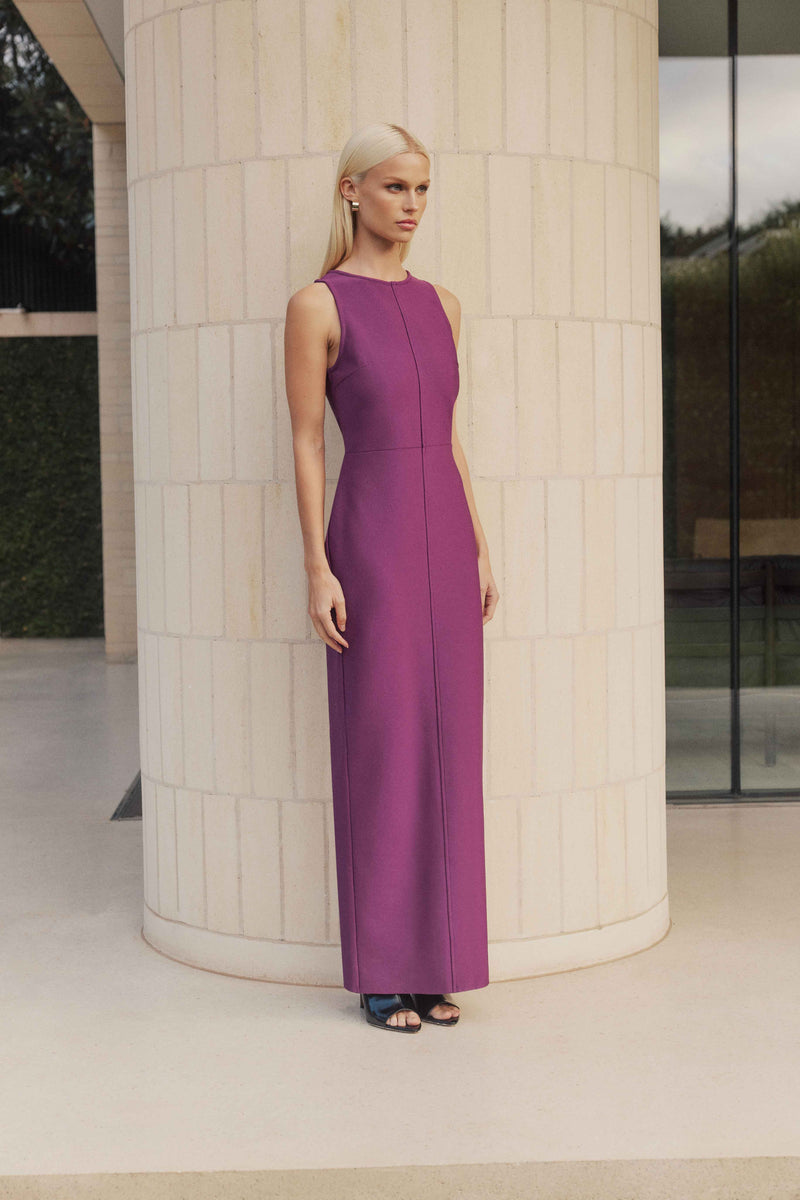 Blonde Model wears Payton Midi Dress side shot