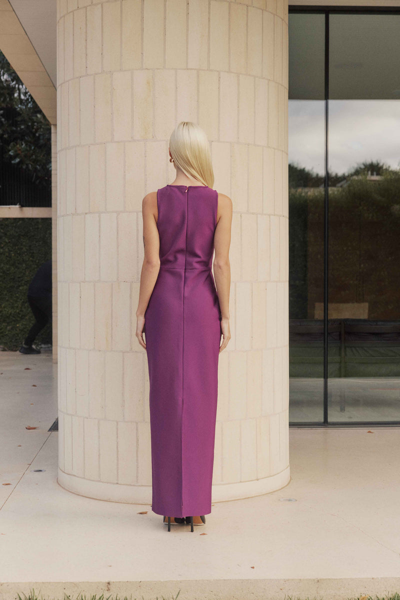 Blonde Model wears Payton Midi Dress back shot