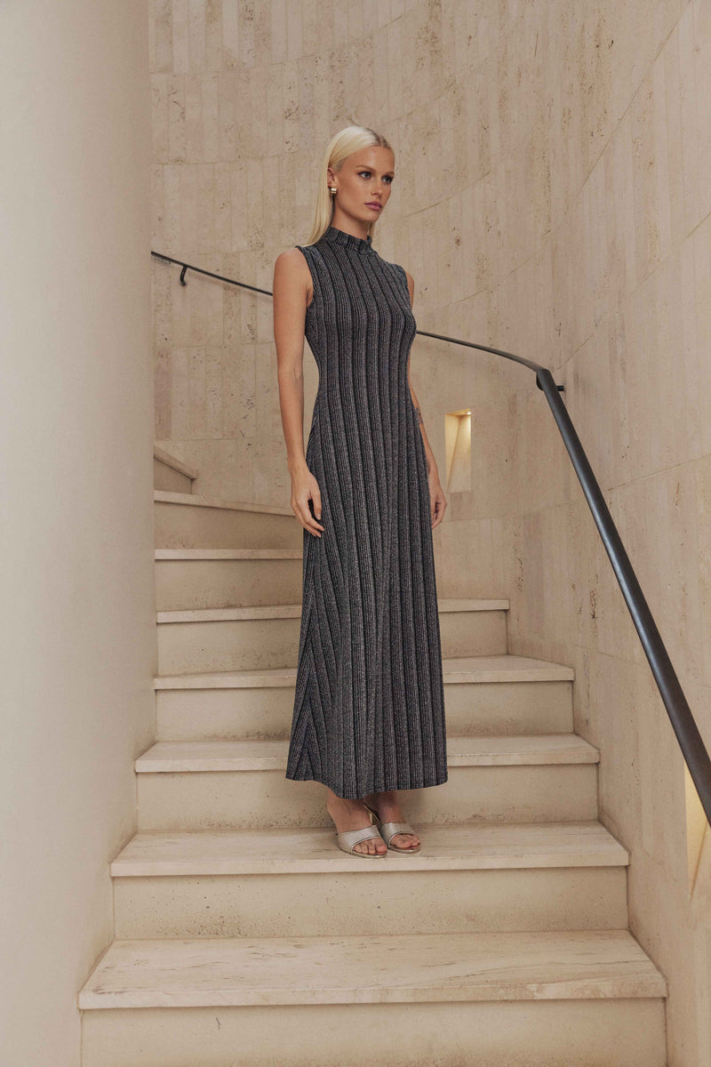 Blonde model wears Tiffany Maxi Sleeveless Dress side shot