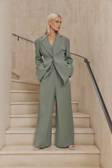 Blonde model wears Antara Oversized Blazer in Green front shot