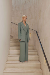 Blonde model wears Antara Oversized Blazer in Green side shot