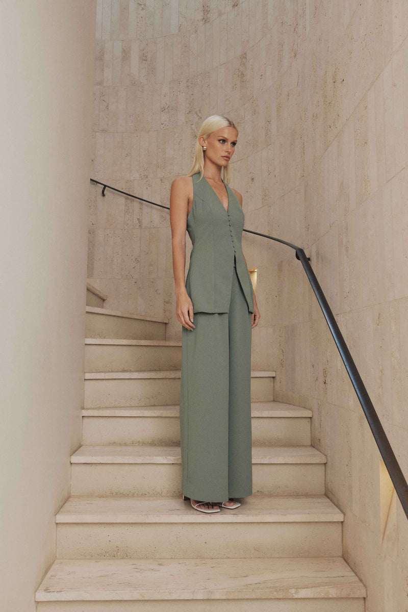 Blonde model wears Houston Wide Leg Pants in Green side shot