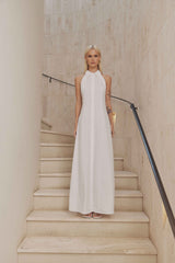 Blonde model wears Chelsea Sleeveless Maxi Dress in White front shot