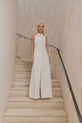 Blonde model wears Chelsea Sleeveless Maxi Dress in White front shot