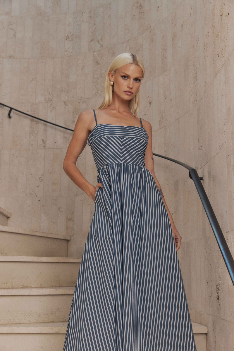 Blonde model wears Spring Sun Dress in Navy Stripe close up shot 