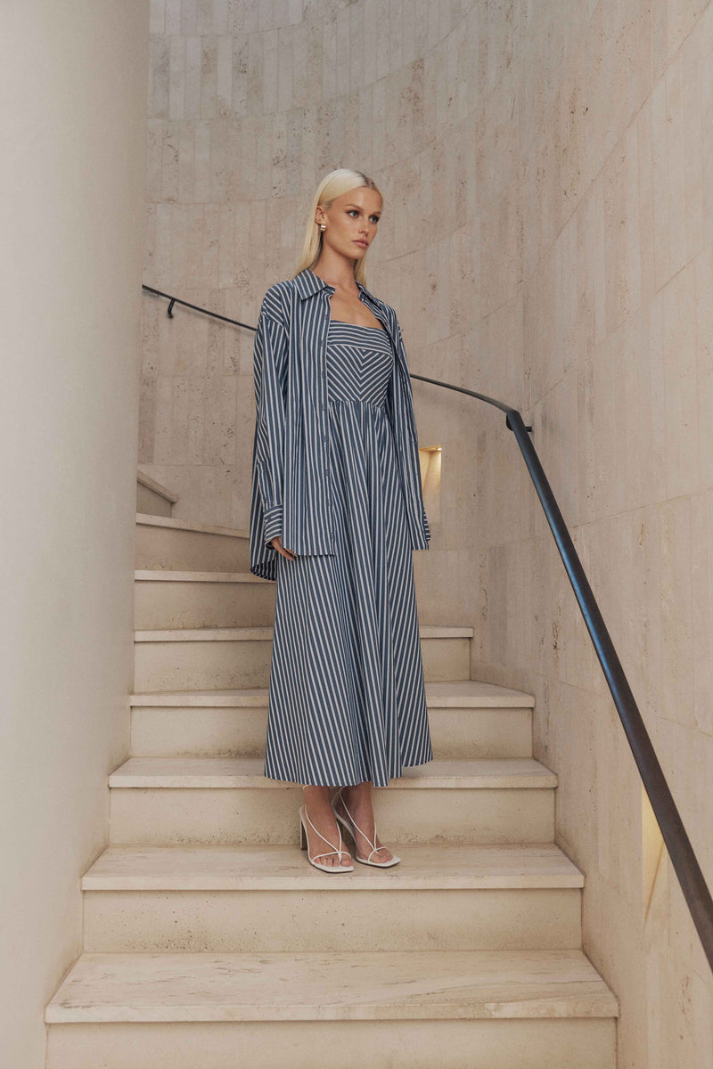 Blonde model wears Perry Oversized Button up Shirt in Navy Stripe front shot