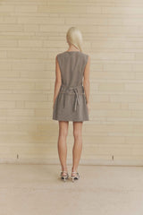 Blonde model wearing Siena V Neck Mini Dress back shot