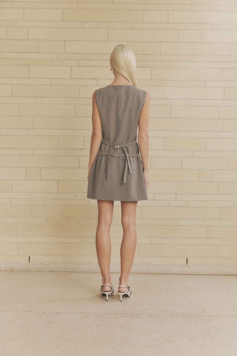 Blonde model wearing Siena V Neck Mini Dress back shot