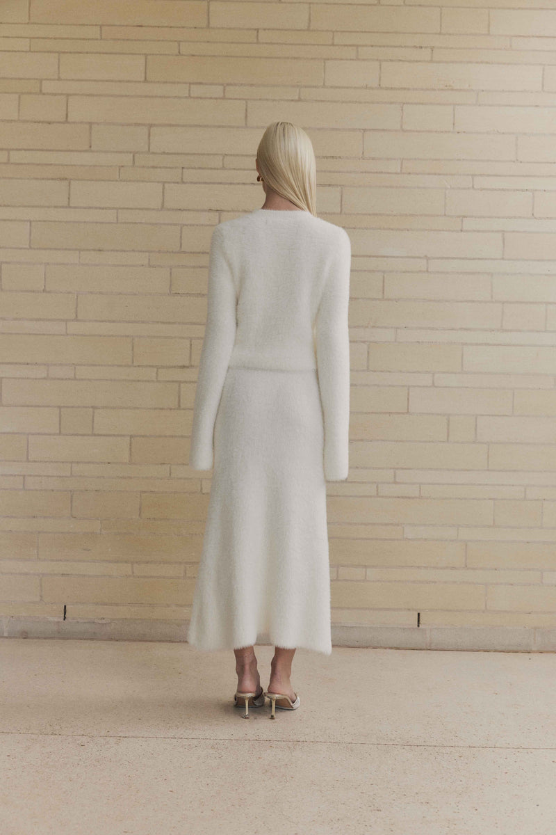 Blonde model wears Carrie Knit Set in White back shot