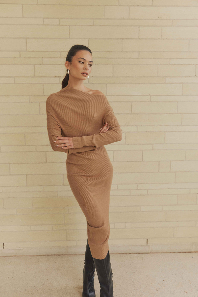 Brunette model wearing Edin Knit Midi Dress side shot