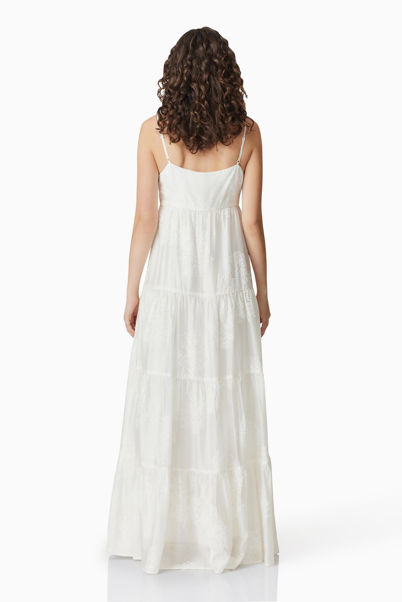 Brunette model wearing Grace Maxi Dress in White back shot