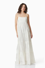 Brunette model wearing Grace Maxi Dress in White posed shot