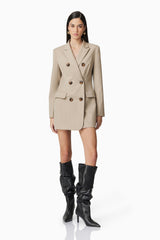 Brunette model wearing Zara Blazer Dress in Beige posed shot