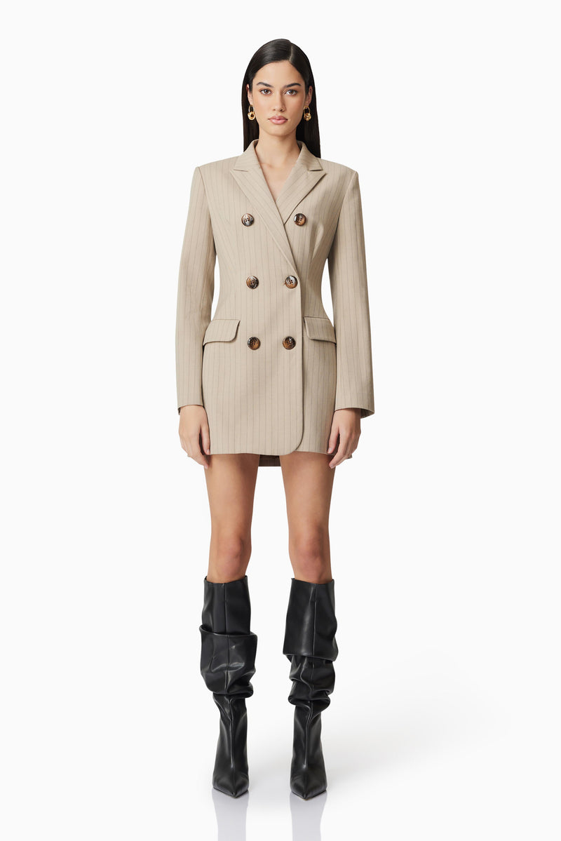 Brunette model wearing Zara Blazer Dress in Beige front shot