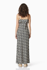 Brunette model wearing Gianna Maxi Dress In Black & White back shot