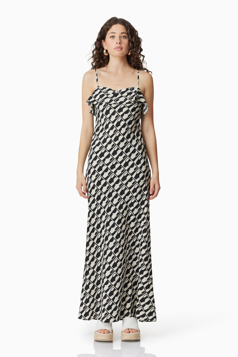 Brunette model wearing Gianna Maxi Dress In Black & White front shot