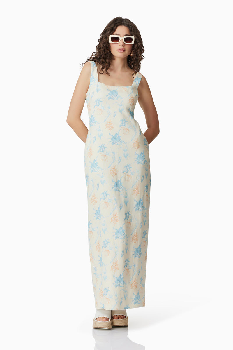 Brunette model wearing Esther Floral Maxi Dress posed shot