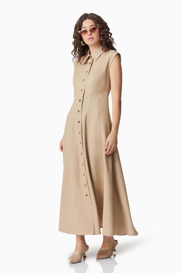 Brunette model wearing Gabriella Midi Dress In Beige side shot