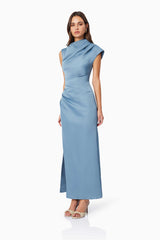 Brunette model wearing Coralie Maxi Gown in Blue side shot