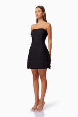 model wearing Hailey Strapless Mini Party Dress In Black side shot