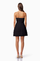 model wearing Hailey Strapless Mini Party Dress In Black back shot