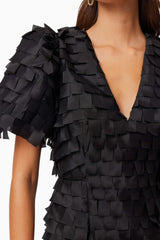 model wearing Hailey Textured 3D Mini Dress In Black close up shot