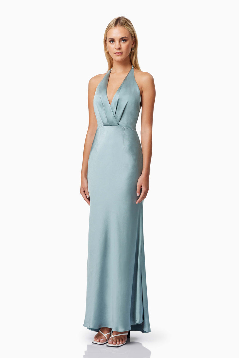 Blonde model wearing Zinnia Backless Satin Maxi Dress In Blue side shot