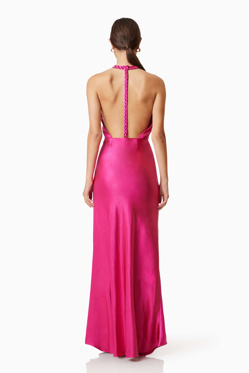 Model wearing Zinnia Backless Satin Maxi Dress In Pink back shot