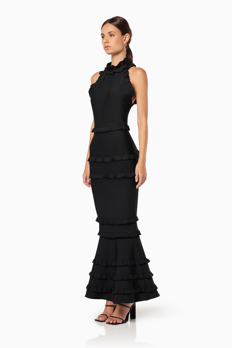 model wearing Theatrical high neckline maxi gown in black side shot