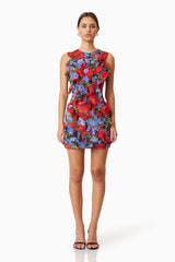 model is wearing Thea Mini Party Printed Dress In Red front shot