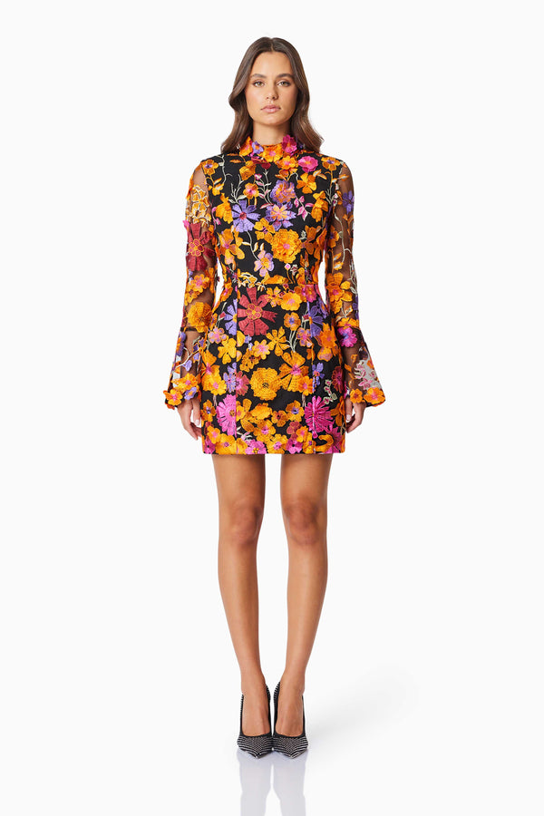 model wearing Alessandra Floral Longsleeve Mini Dress In Orange front shot