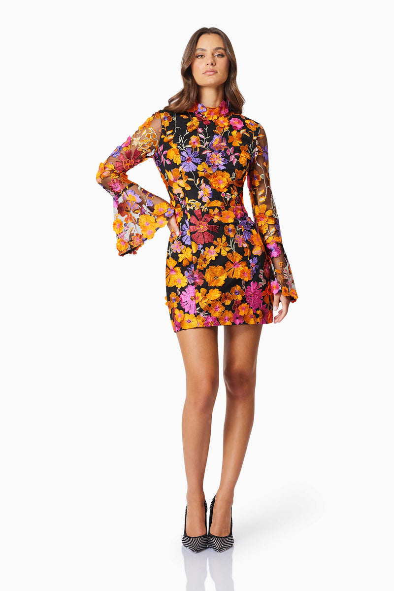 model wearing Alessandra Floral Longsleeve Mini Dress In Orange front shot