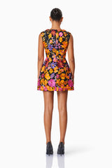 model wearing Alessandra Floral Strapless Mini Dress In Pink back shot