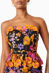 model wearing Alessandra Floral Strapless Cocktail Dress In Pink close up shot