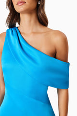 Brunette model wearing Alice Cocktail One Shoulder Midi Dress in Blue detail shot